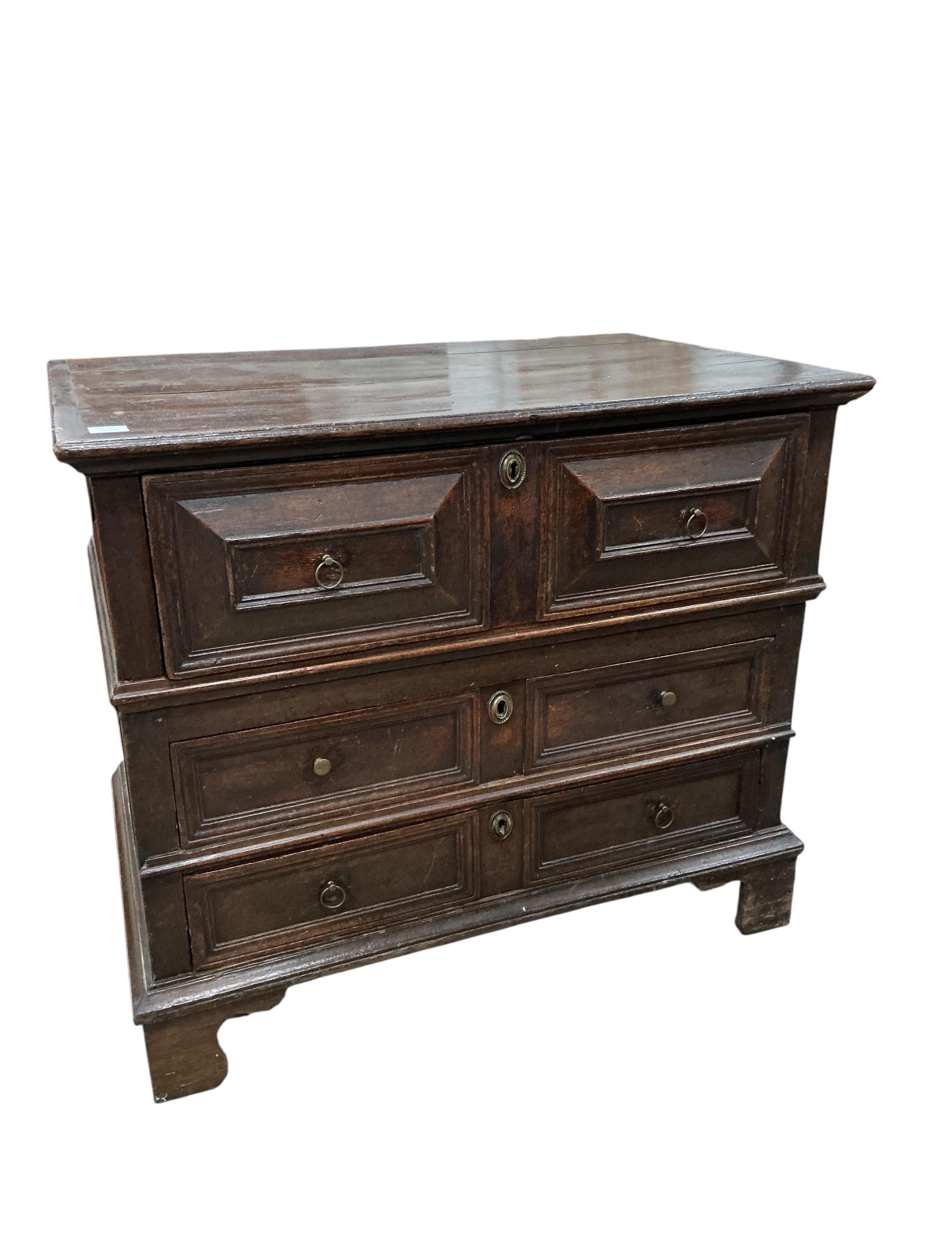 A William and Mary oak two part chest, width 108cm, depth 69cm, height 93cm.